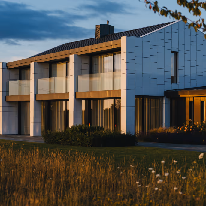 View of a house from outside with green garden