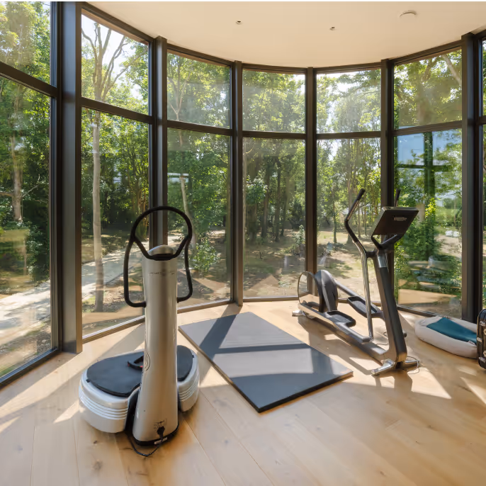 A gym with large windows