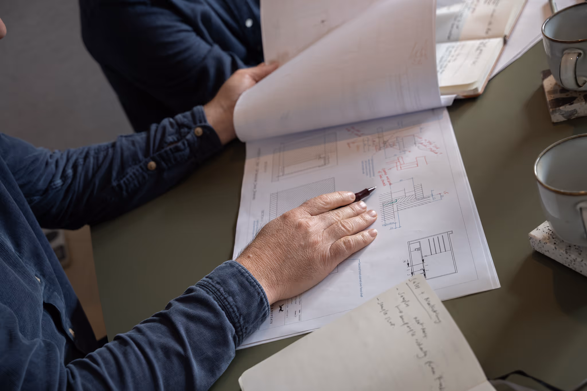 Architects working on layouts.