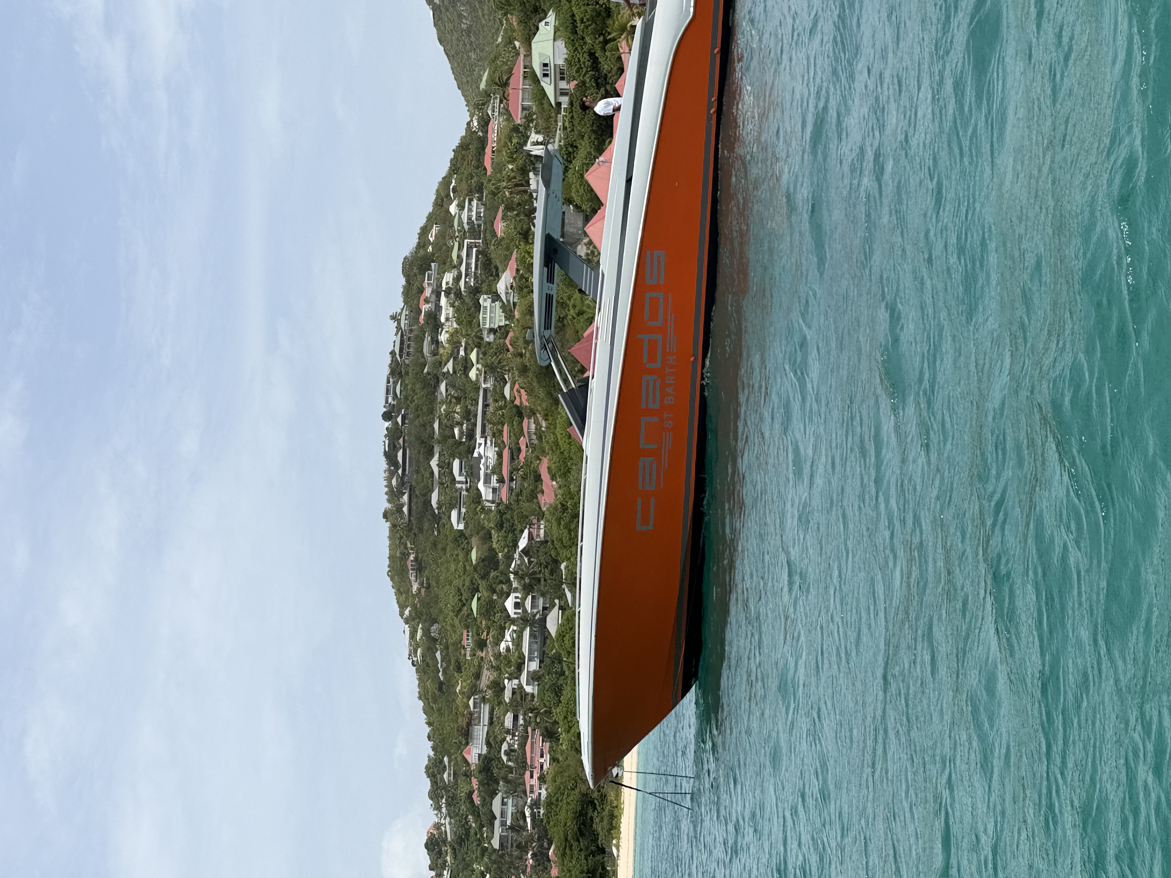Private speedboat anchored off the coast of St. Barths during a luxury boat excursion.