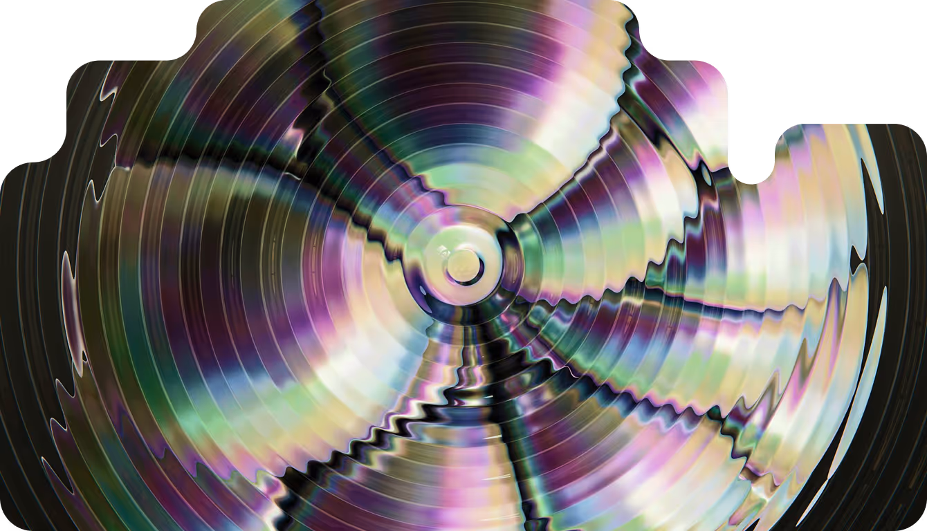 A close up of a colorful fan on a black background.