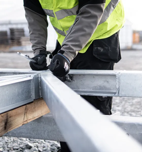 Worker tightening bolts