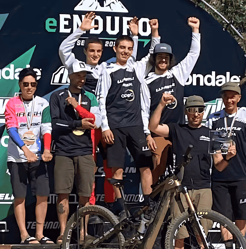 Whistle Bikes e-enduro full-carbon mountain bike on podium showcasing performance and innovation