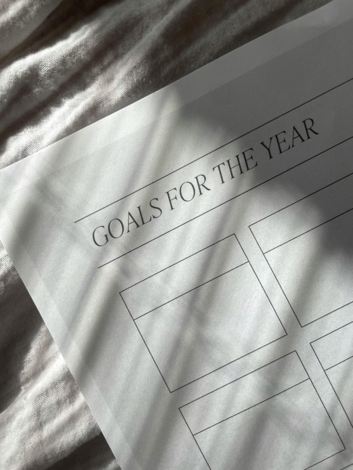 Setting Intentions for New Year at Home: Empty tables with "Goals for the Year" 