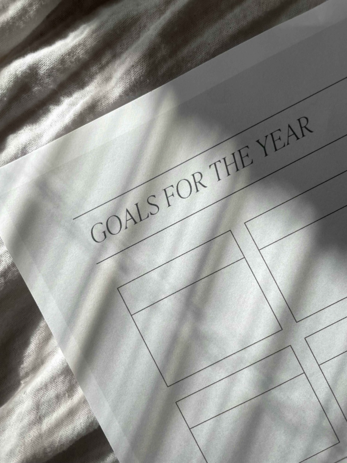 Setting Intentions for New Year at Home: Empty tables with text "Goals for the Year" 