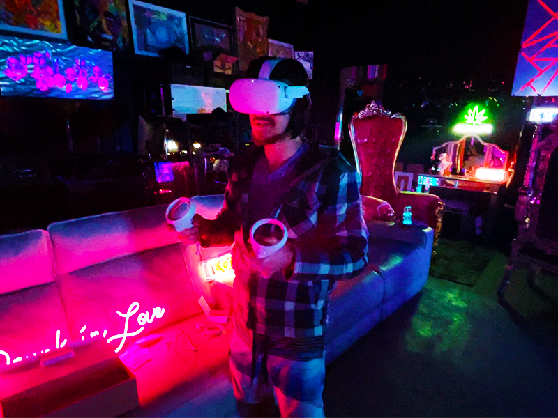 David PJ DJ VR test headset production studio dim neon lighting extended reality playtest technician