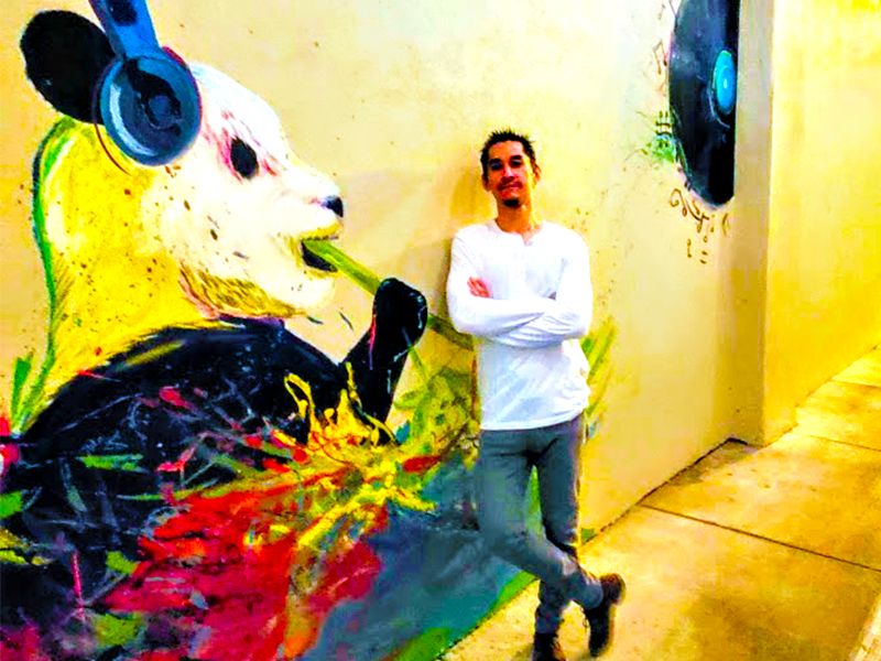PJ DJ Trakataka panda wall mural in Orlando, FL downtown outfit photoshoot graffiti paint street art