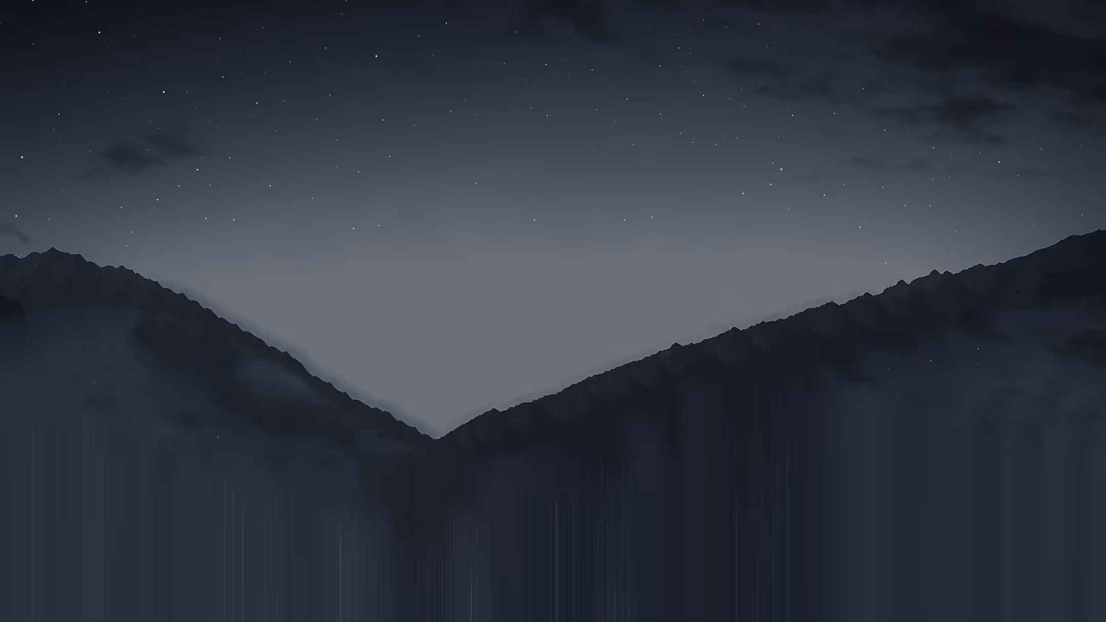 A black and white photo of a mountain at night.