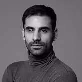 A black and white photo of a man.