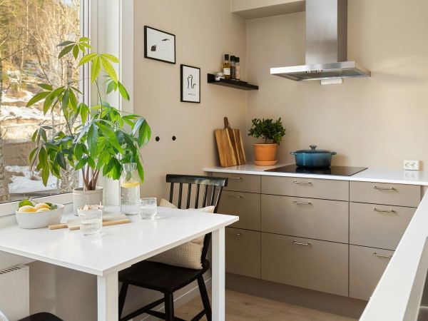 Clean, bright kitchen interior representing healthy indoor air quality