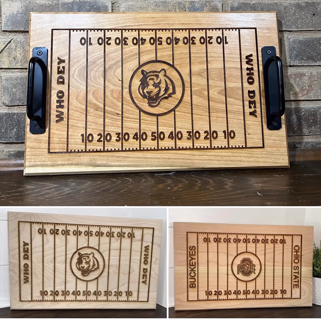 Three wooden serving trays engraved with football field designs and team logos, including a tiger and Ohio State Buckeyes.