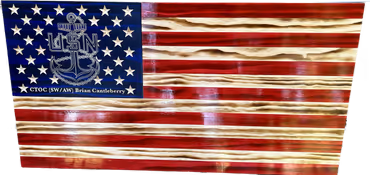 Wooden American flag with US Navy officer insignia and text CTOC (SW/AW) Brian Cannalberry.