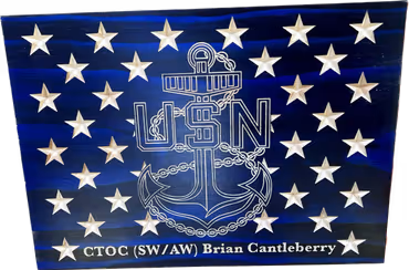 Blue American flag with white stars and US Navy anchor emblem with text honoring CTOC Brian Cantleberry.