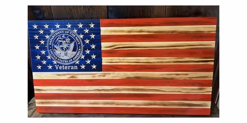 American flag with Navy Department seal and the word Veteran in the blue star field.