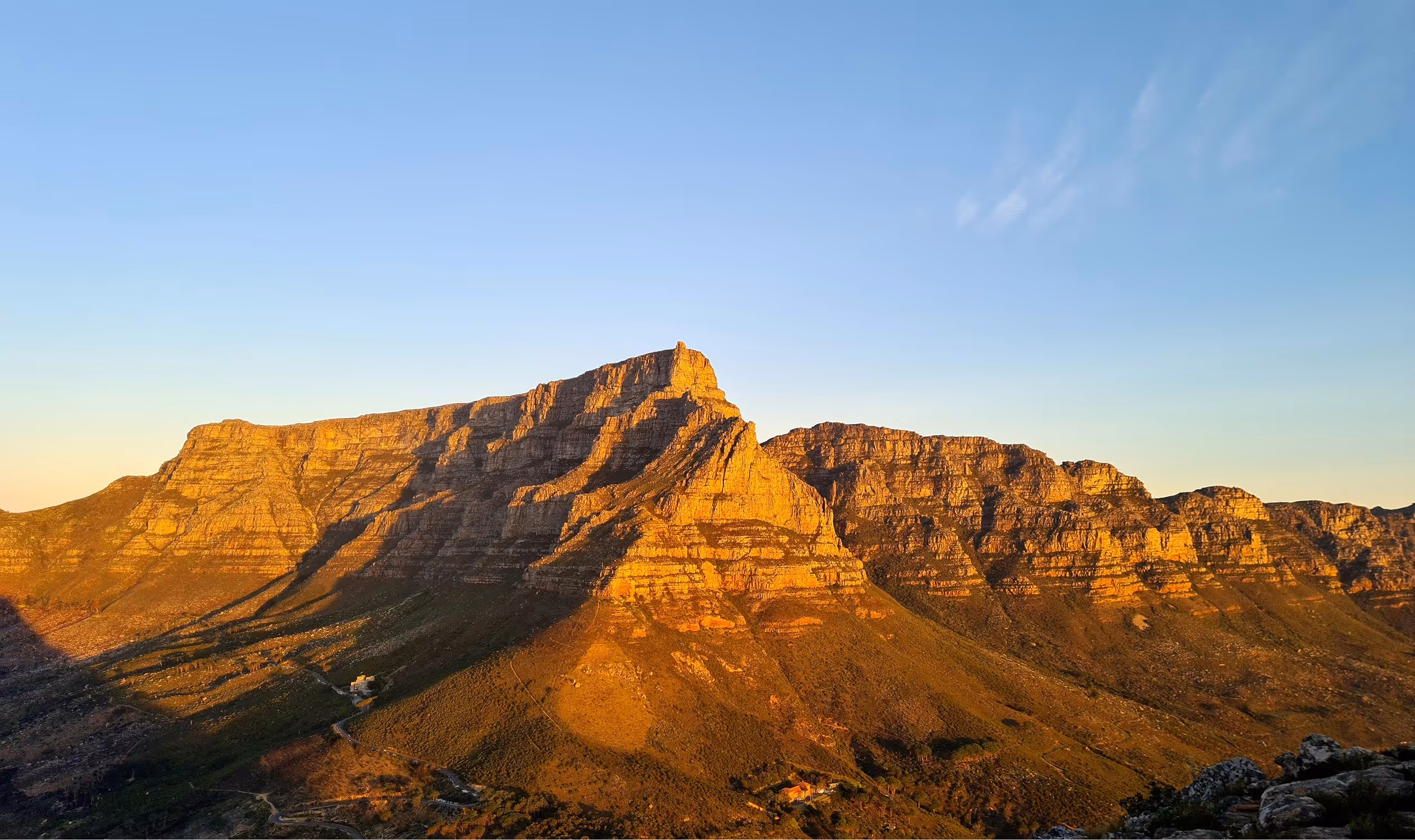 Landscape photo of Table Mountain, Cape Town during sunset.