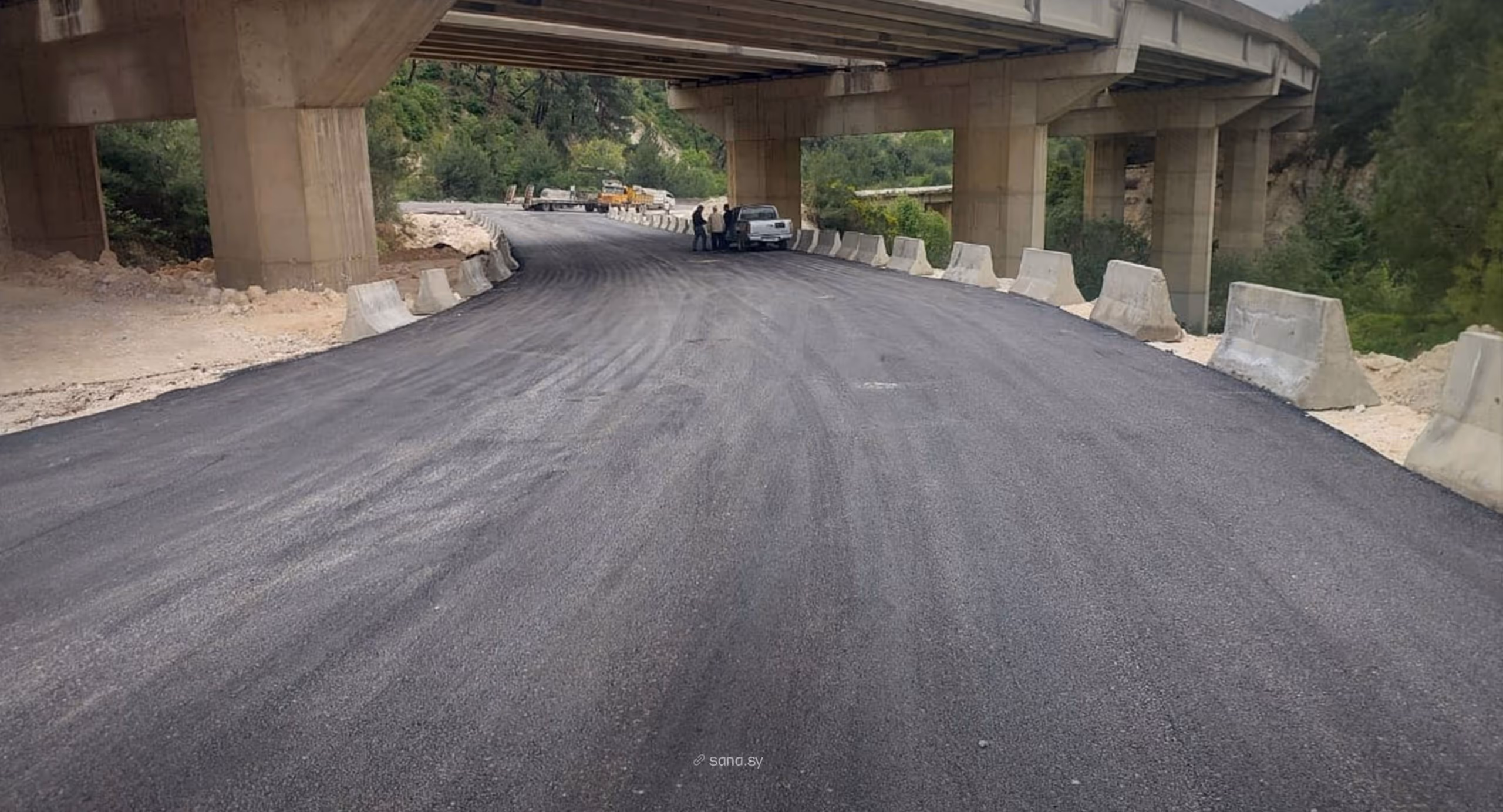 Construction crew working on the bridge deck reconstruction