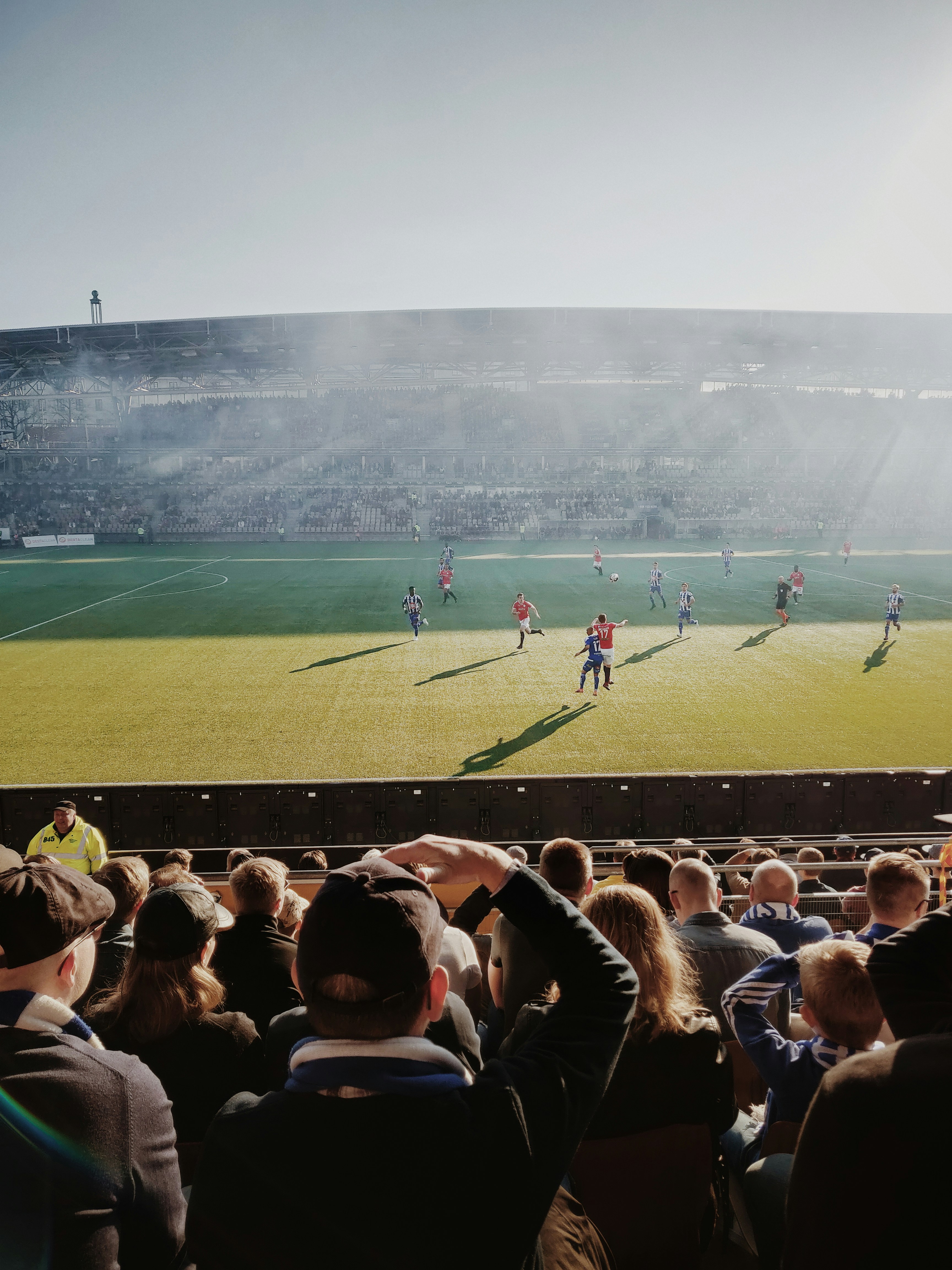 Football stadium with a ongoing match.