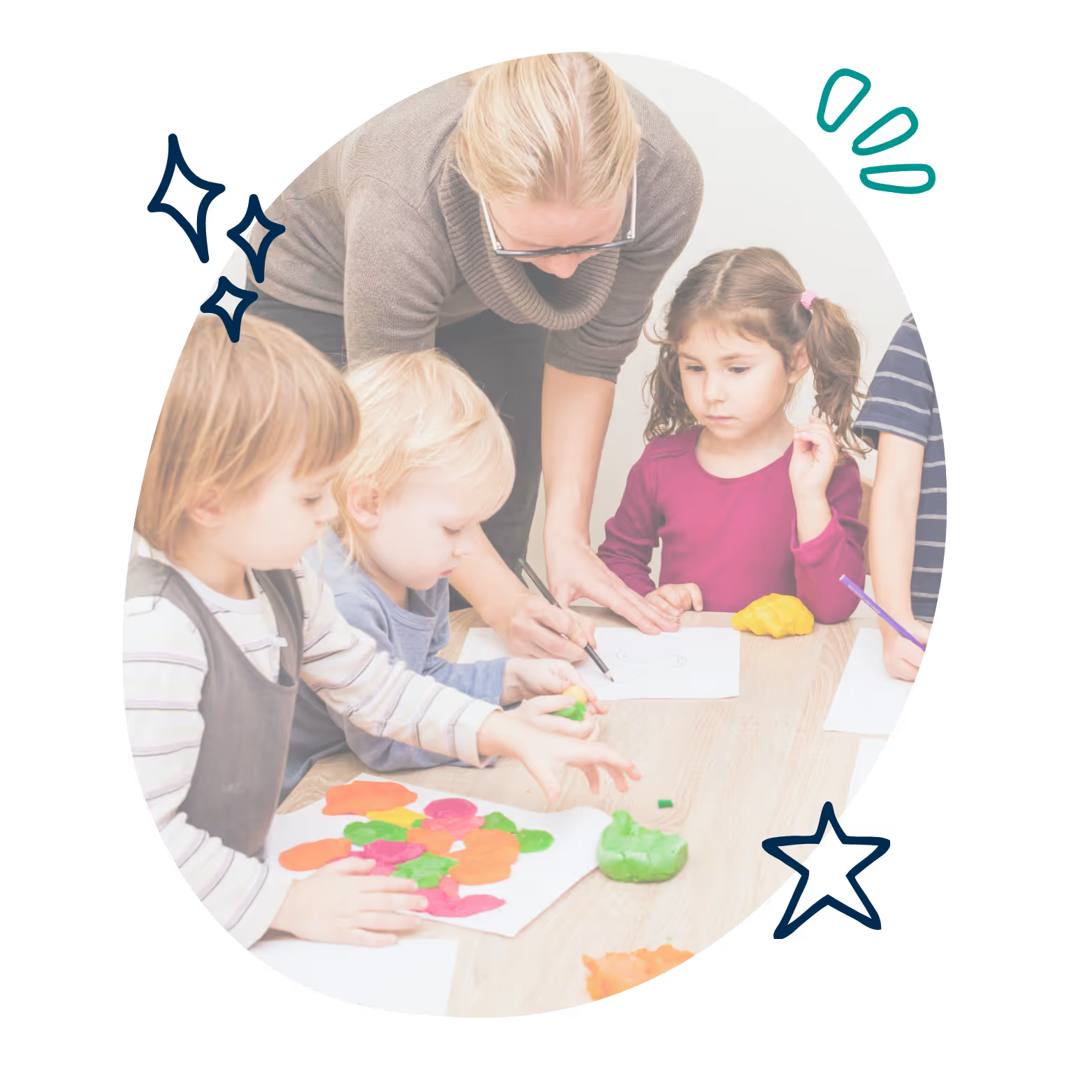 Teacher guiding young children drawing and playing with colorful modeling clay at a table.