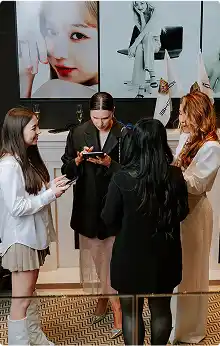 Group of people in elegant outfits at a stylish event.