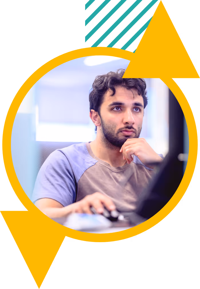 A developer looking at a computer screen.