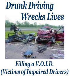 Drunk Driving Wrecks Lives — Filling a V.O.I.D. (Victims of Impaired Drivers). Photograph of two severely wrecked vehicles at a crash scene.