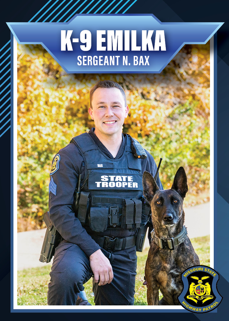 Sergeant Nolan A. Bax with K-9 Emilka
