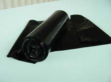 A roll of black trash bags used as a known standard.