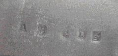 A toolmark examiner comparing striations under a comparison microscope.