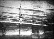 A bullet being examined under a comparison microscope.