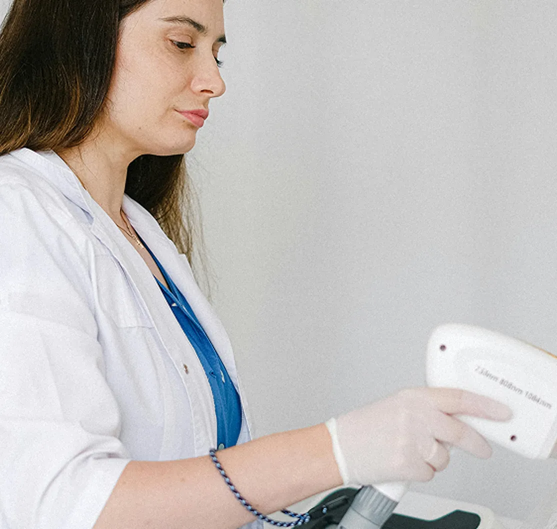 woman providing IPL treatment