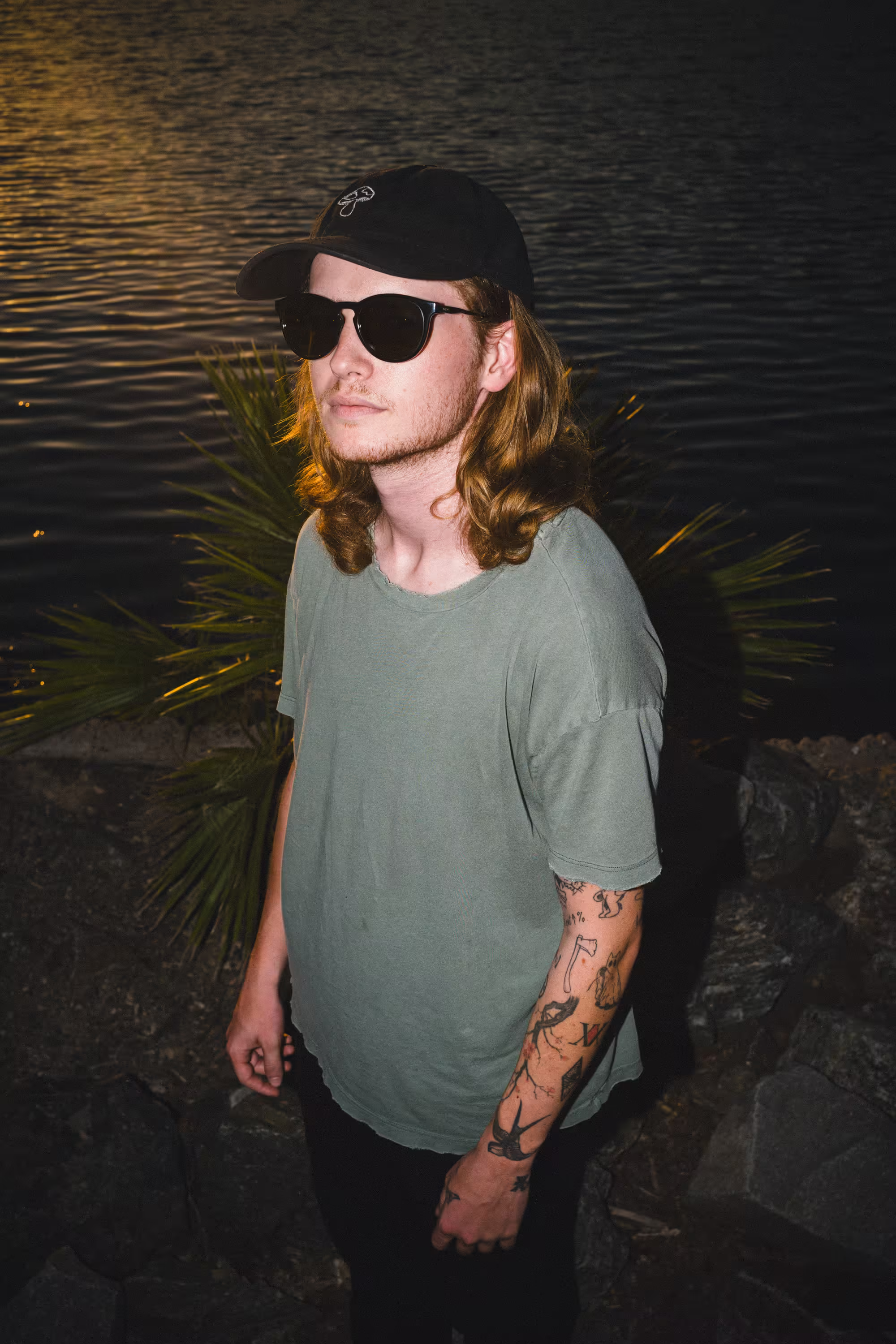 Arizona DJ Booni posing for a professional photoshoot, available for private and public events.