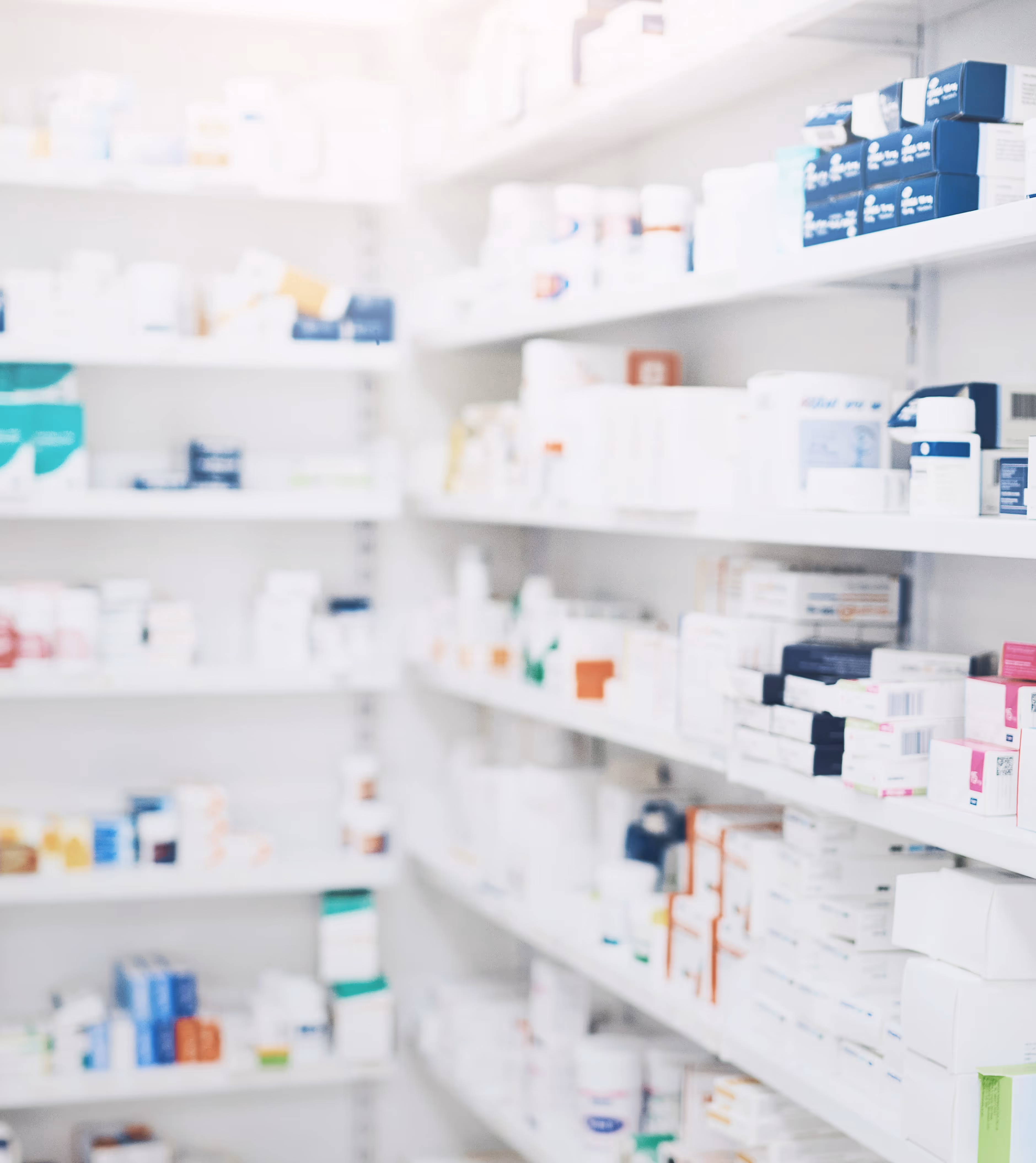 Bright pharmacy interior with shelves of prescription medications