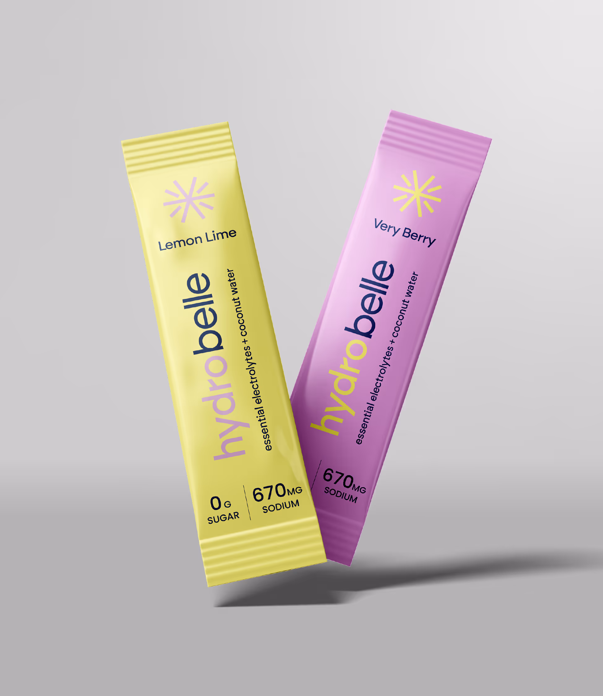 Two HydroBelle hydration stick packs in lemon-lime and berry flavors