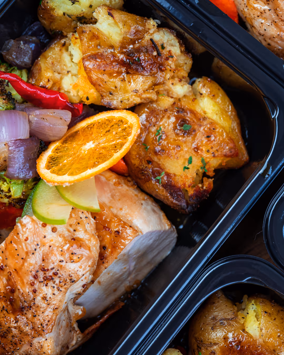 Colorful plate of lean protein, vegetables, and grains illustrating a balanced, protein-rich meal recommended for GLP-1 nutrition support.