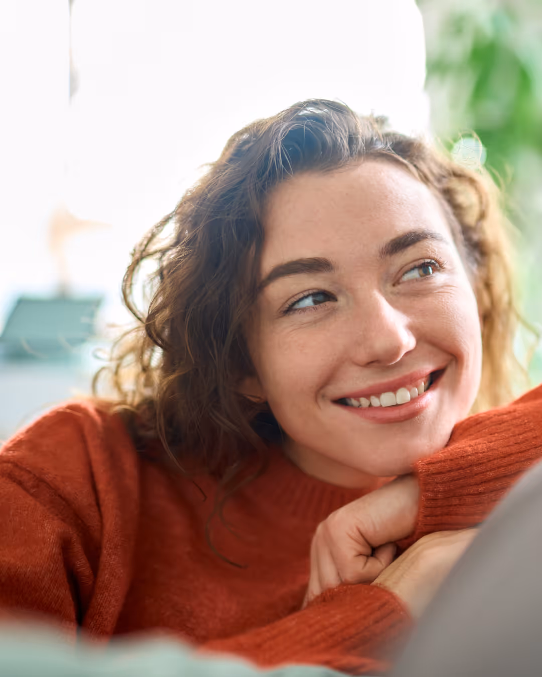 Woman smiling with a relaxed, confident expression, reflecting trust and peace of mind from choosing a LegitScript-certified telehealth provider