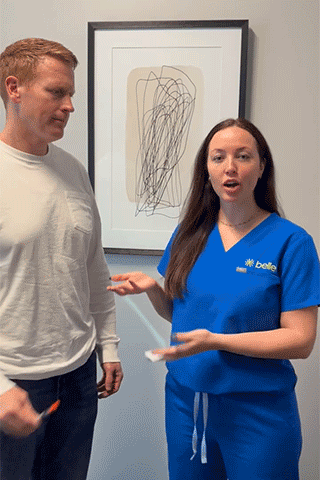 GIF of Belle nurse holding a medication injection syringe, smiling during treatment testimonial