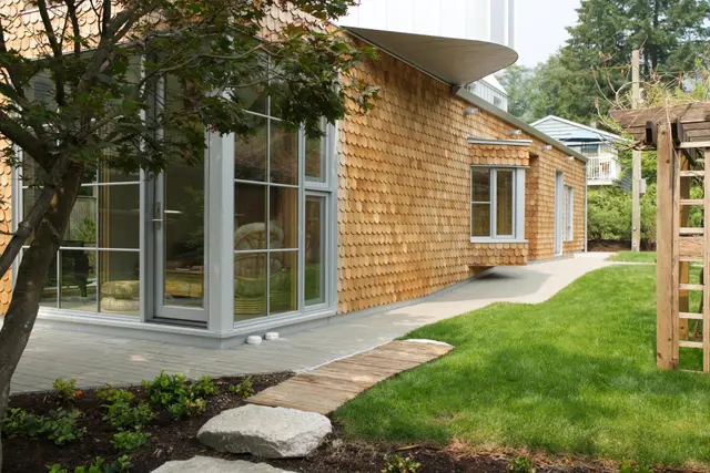 Banbury Exterior round pattern cedar shingles and view of yard