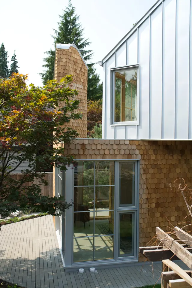 Banbury Exterior round pattern cedar shingles