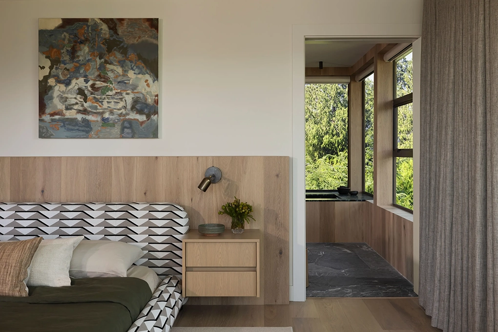 Deep Cove master bedroom to master bathroom