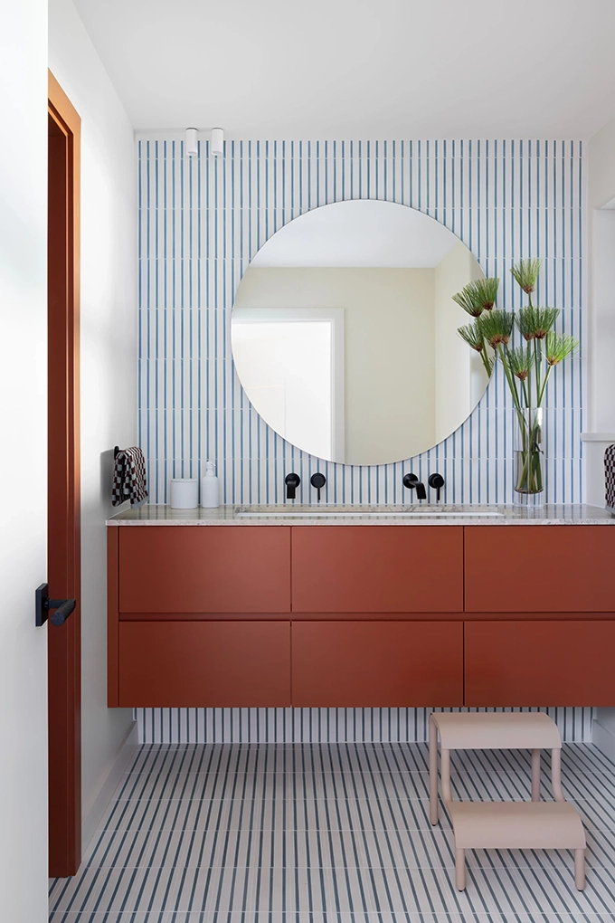Deep Cove bathroom with blue striped tile detail