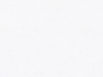 Poeira fina dispersa em fundo branco.