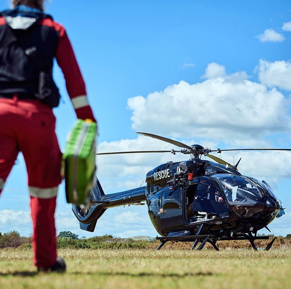 Search and rescue team and helicopter