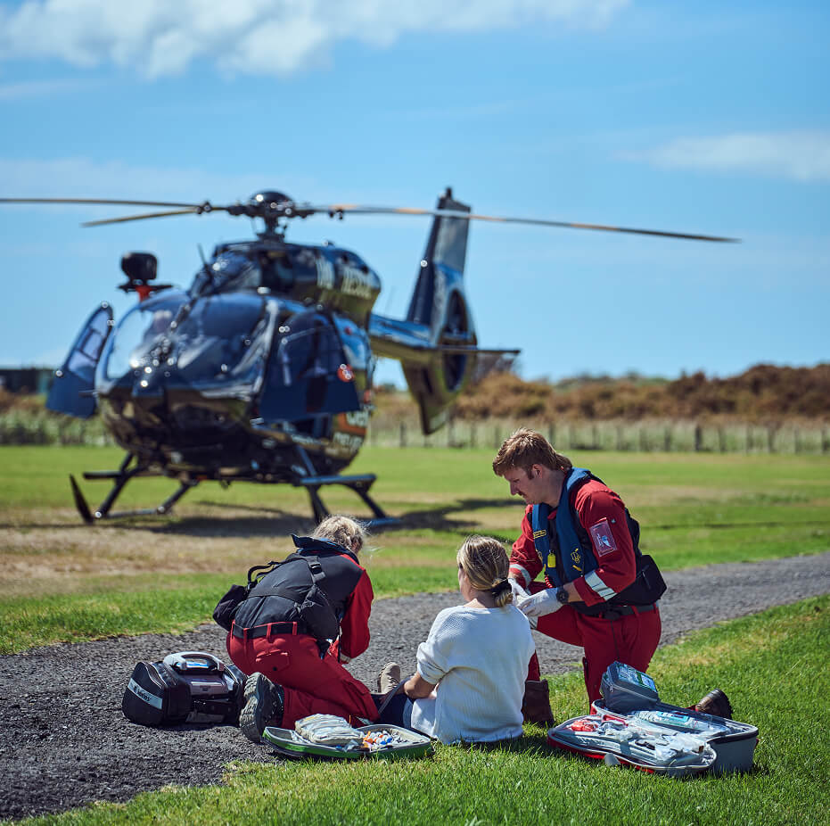 Search and rescue medic helping a patient