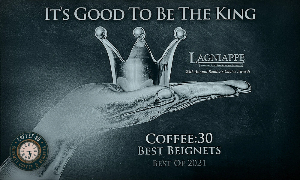 Graphic of a hand holding a crown with text declaring Coffee:30 as the Best Beignets and Best of 2021 by Lagniappe Reader's Choice Awards.