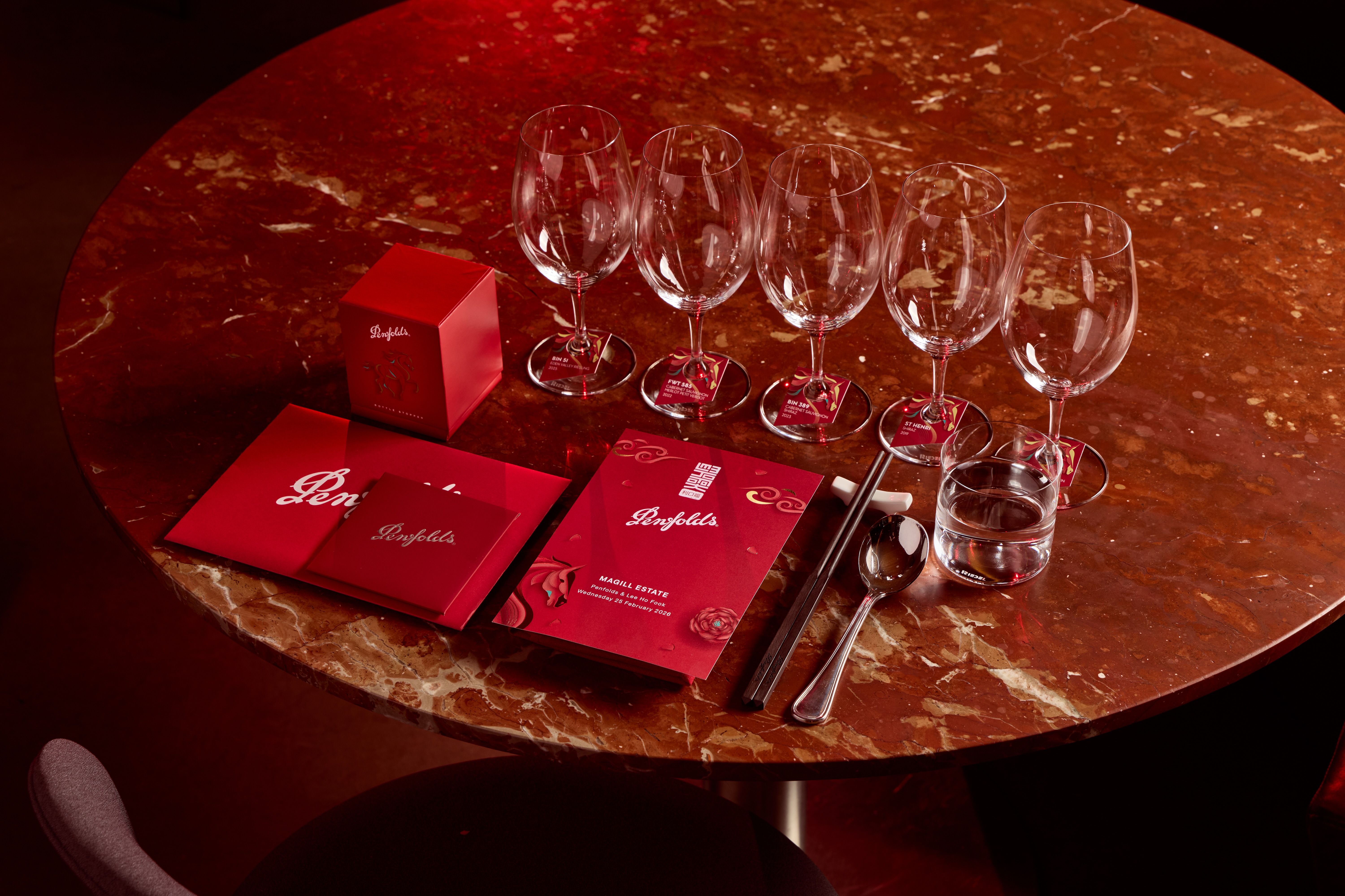 Penfolds Lunar New Year — branded table settings with menus and decorative pieces