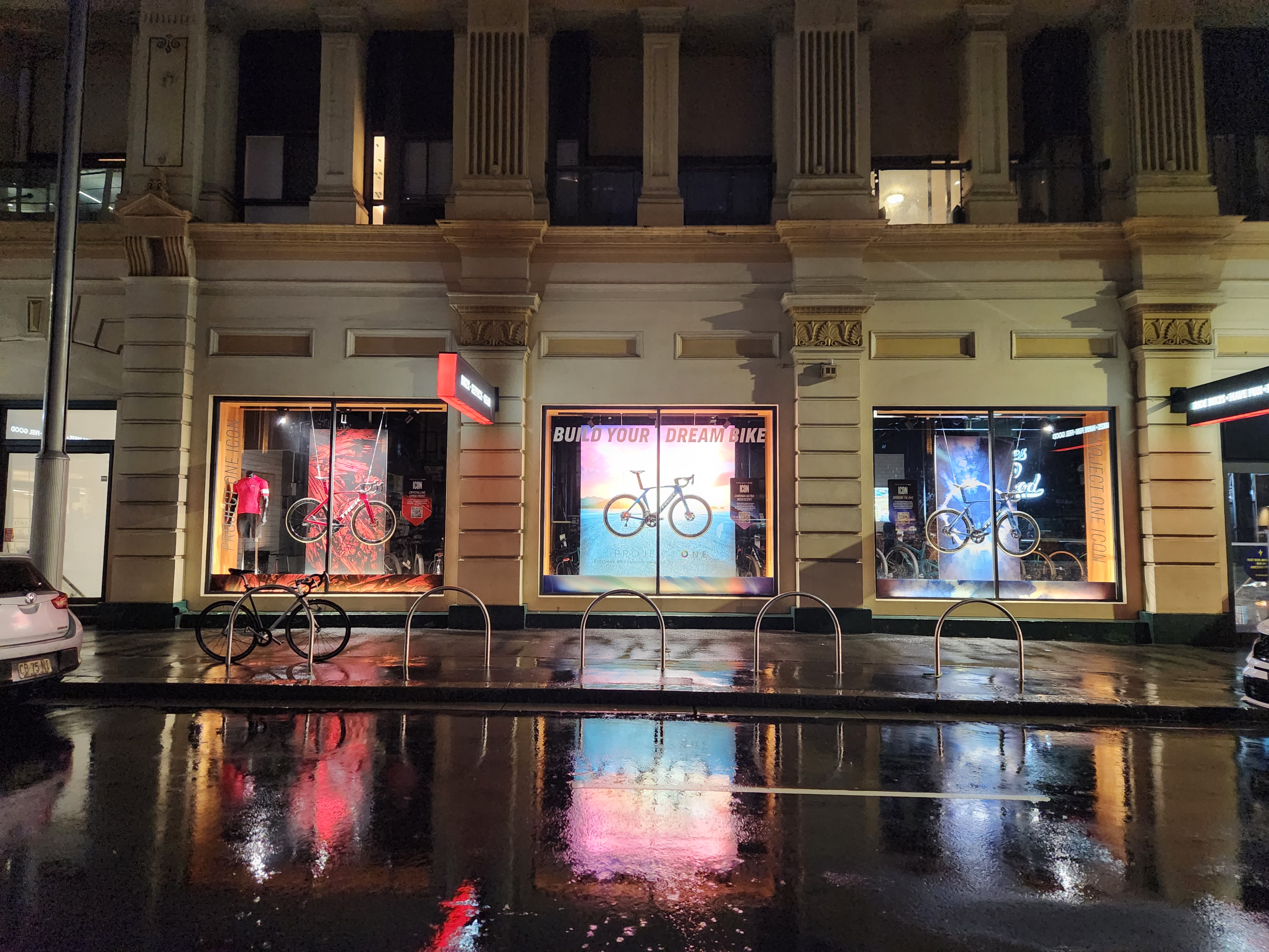 Trek Tour De France Display — full storefront window graphics installation view