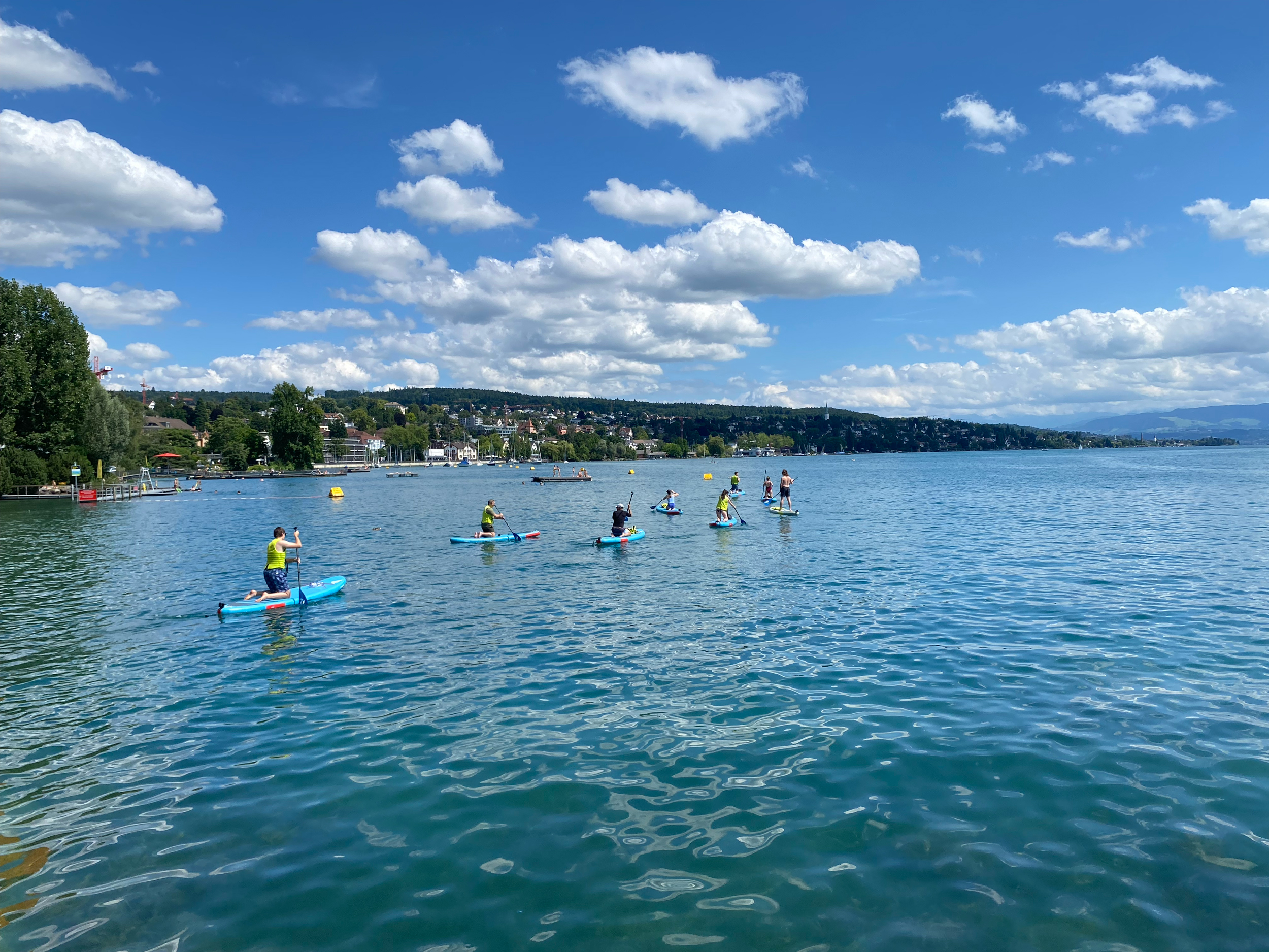 Group SUP session on Lake Zurich — private rental event
