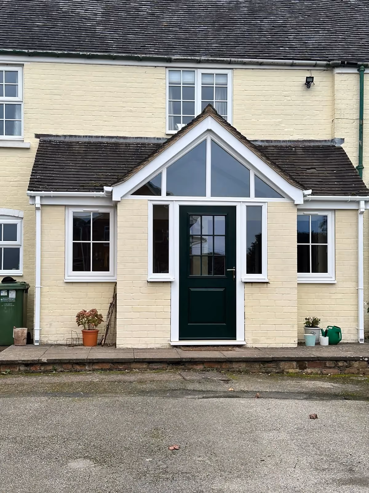 Grey uPVC windows fitted to a house exterior