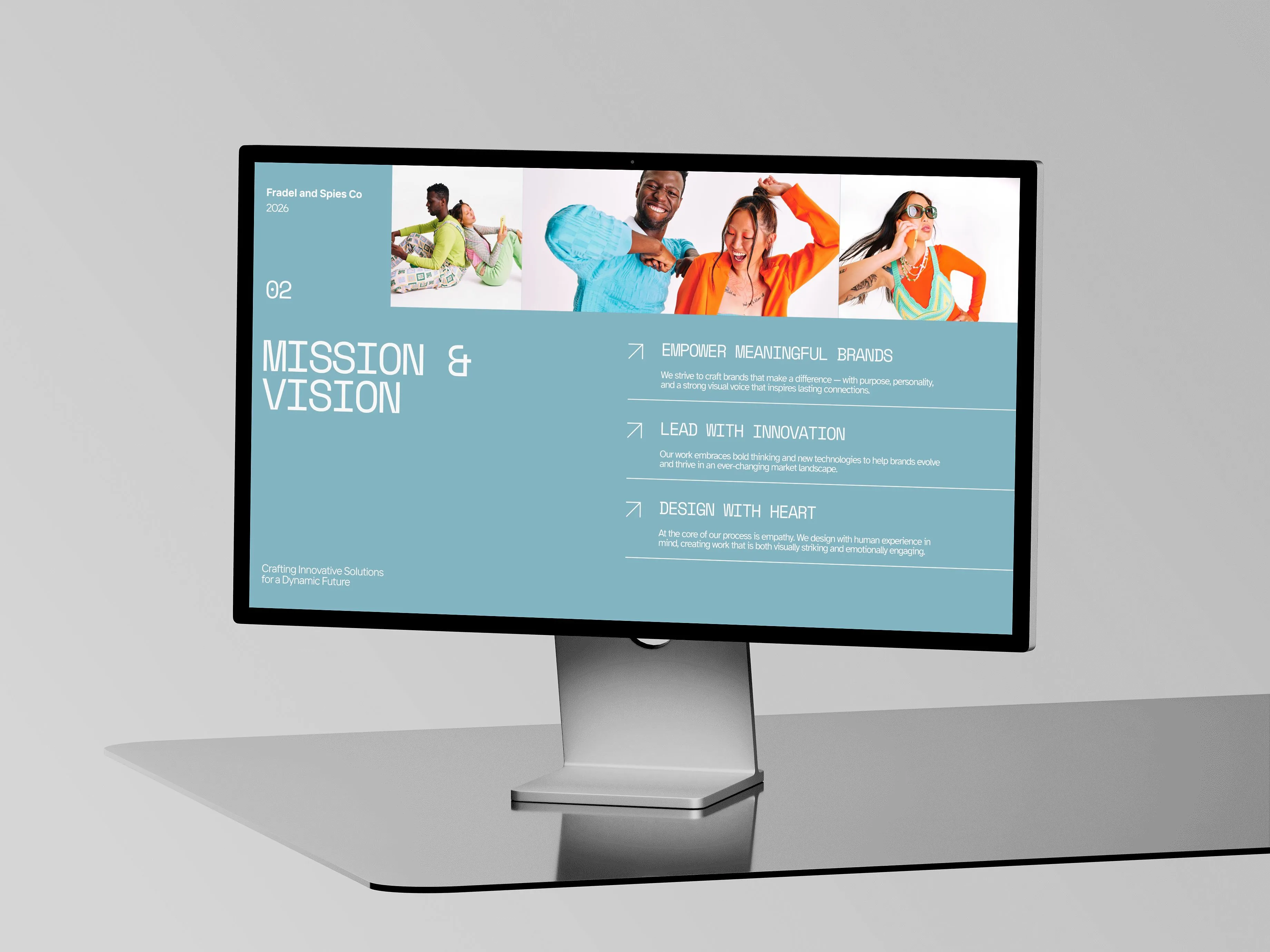 Desktop monitor displaying a website with modern web graphicsProfessional business presentation design – modern company profile deck displayed on desktop screen