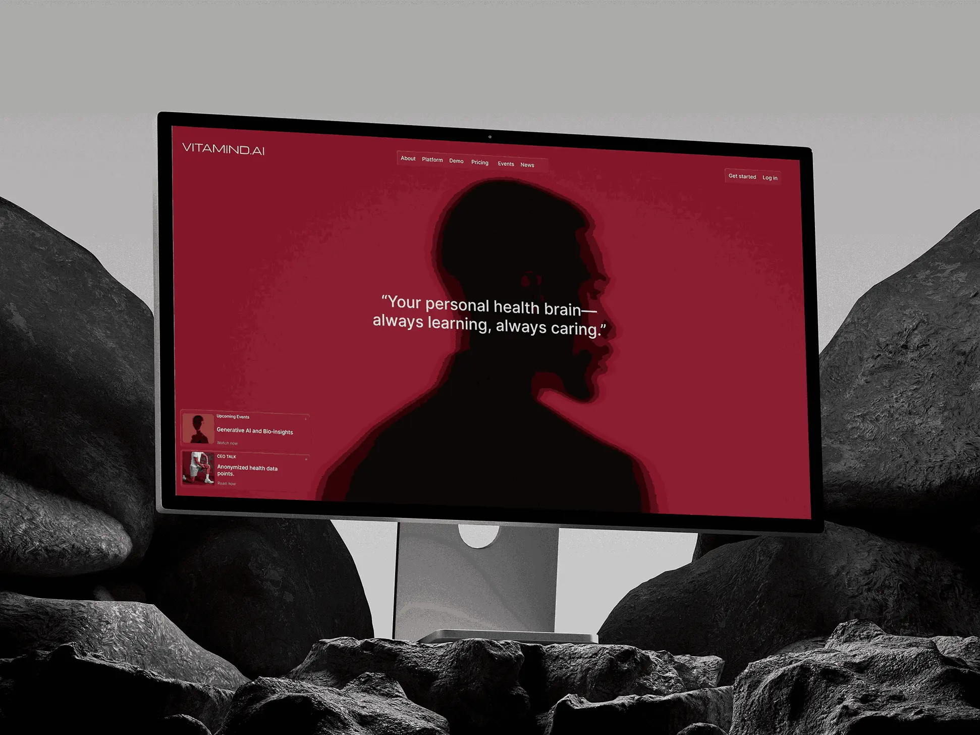 Studio Display in front of rocks showcasing clean digital design